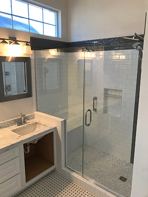 Glass enclosure with matching hardware