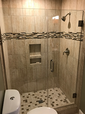 Glass shower enclosure