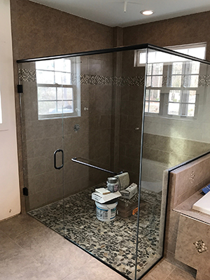Finished glass shower door